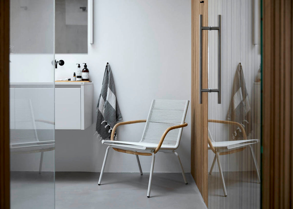 Sculptural lounge chair in rattan with Scandinavian design