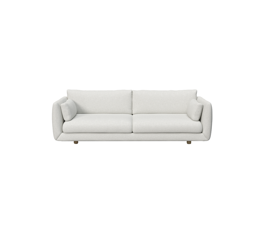 Ljusgrå modern soffa med minimalistisk design.