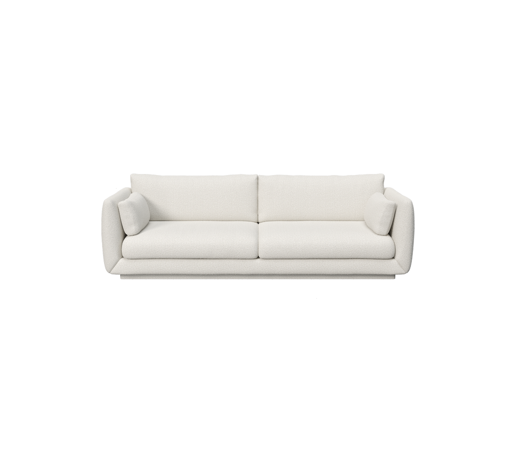 en modern vit soffa med minimalistisk design.
