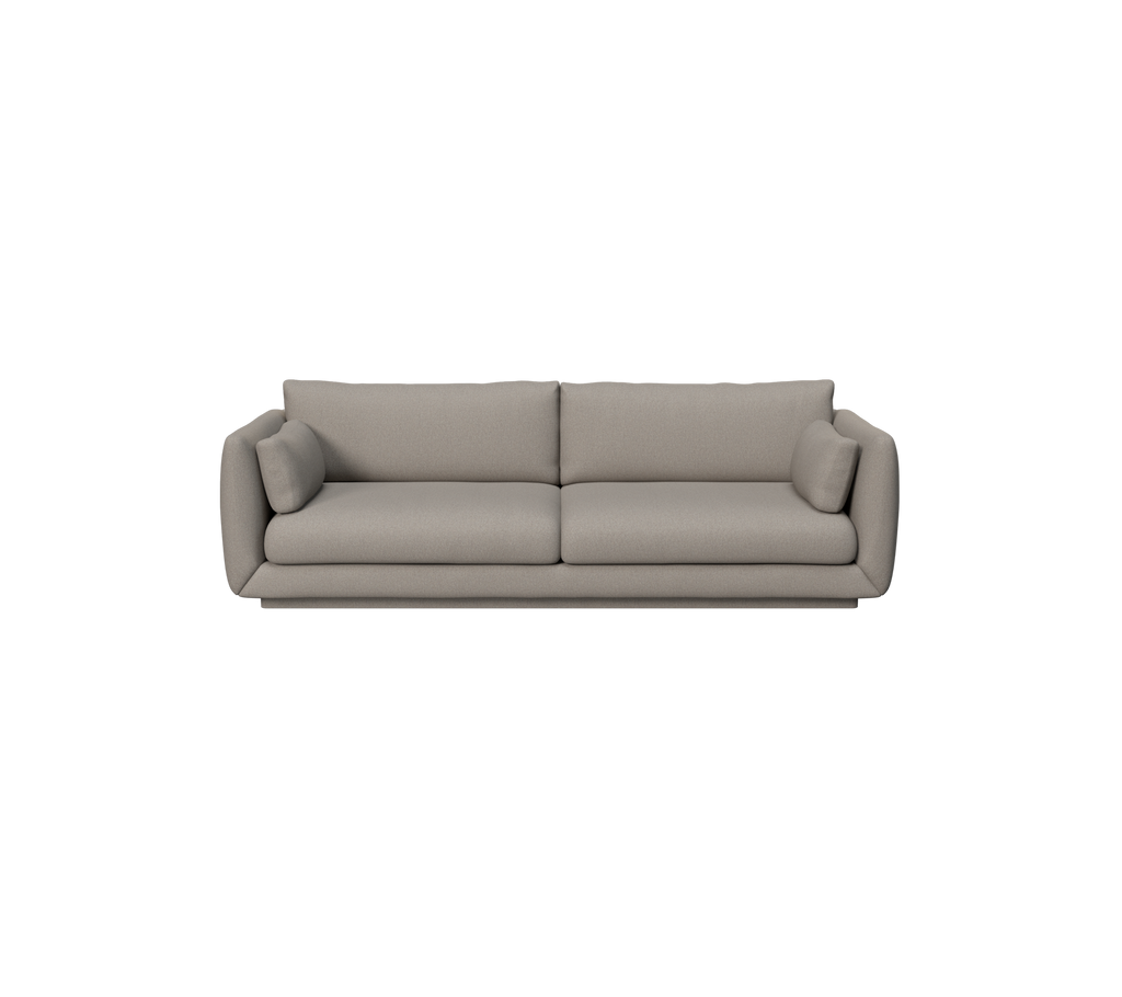 Ljusbrun modern soffa med två kuddar i en stilren design.