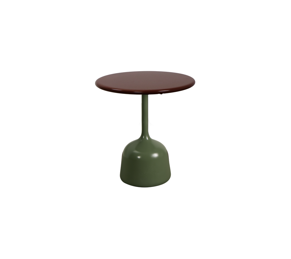 Olivgrönt bord med en bourgognefärgad topp.