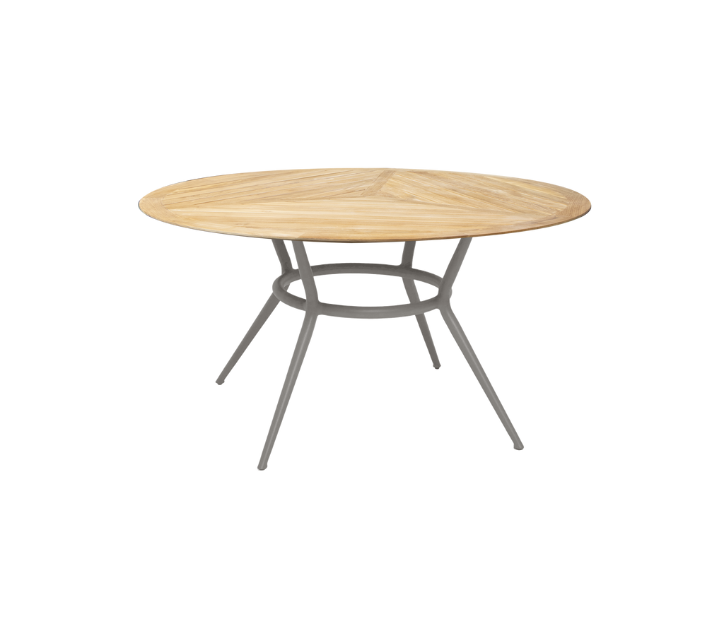 Taupe runt bord med en enkel design och eleganta ben.