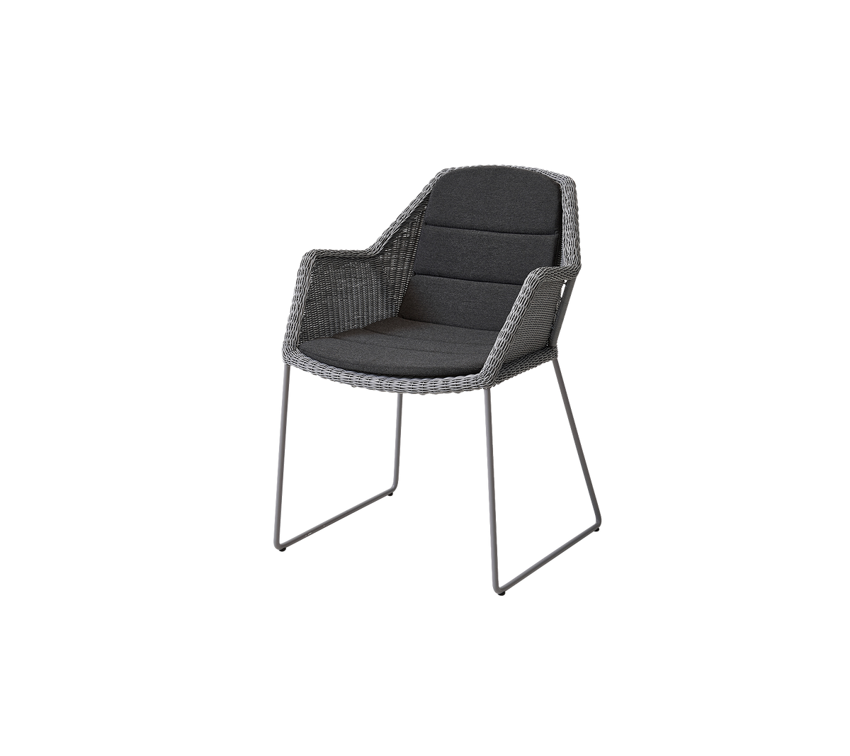Stilig stol med ett vävt design, plyschkuddar och smala metallben, idealisk för moderna miljöer.