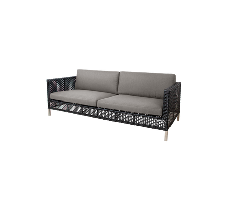 Stilsoffa med vävt mönster och grå kuddar, designad för komfort och modern estetik. Perfekt för vilket sittområde som helst.