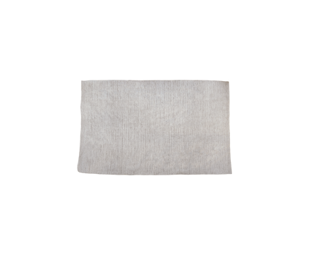 Sand flerfärgad produkt visad på en enfärgad bakgrund.