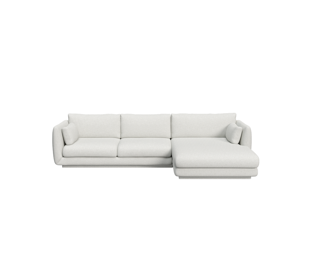 Ljusgrå modern soffa med minimalistisk design.