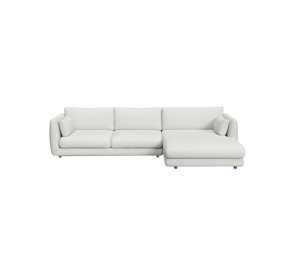Ljusgrå modern sektionell soffa med en ren design.