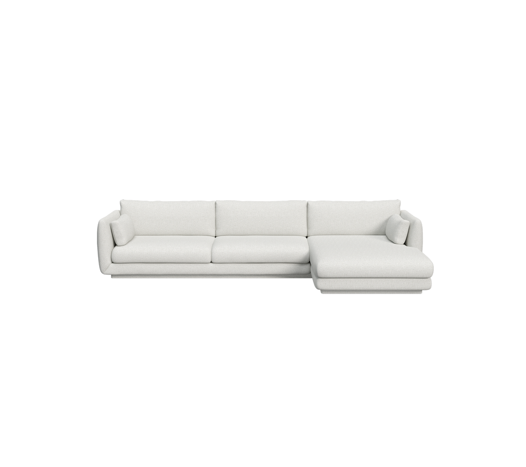 Ljusgrå modern soffa med en sektionell design.