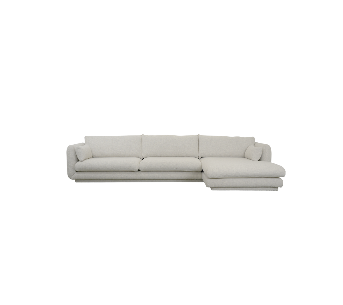 Modern sandfärgad soffa med en ren design.