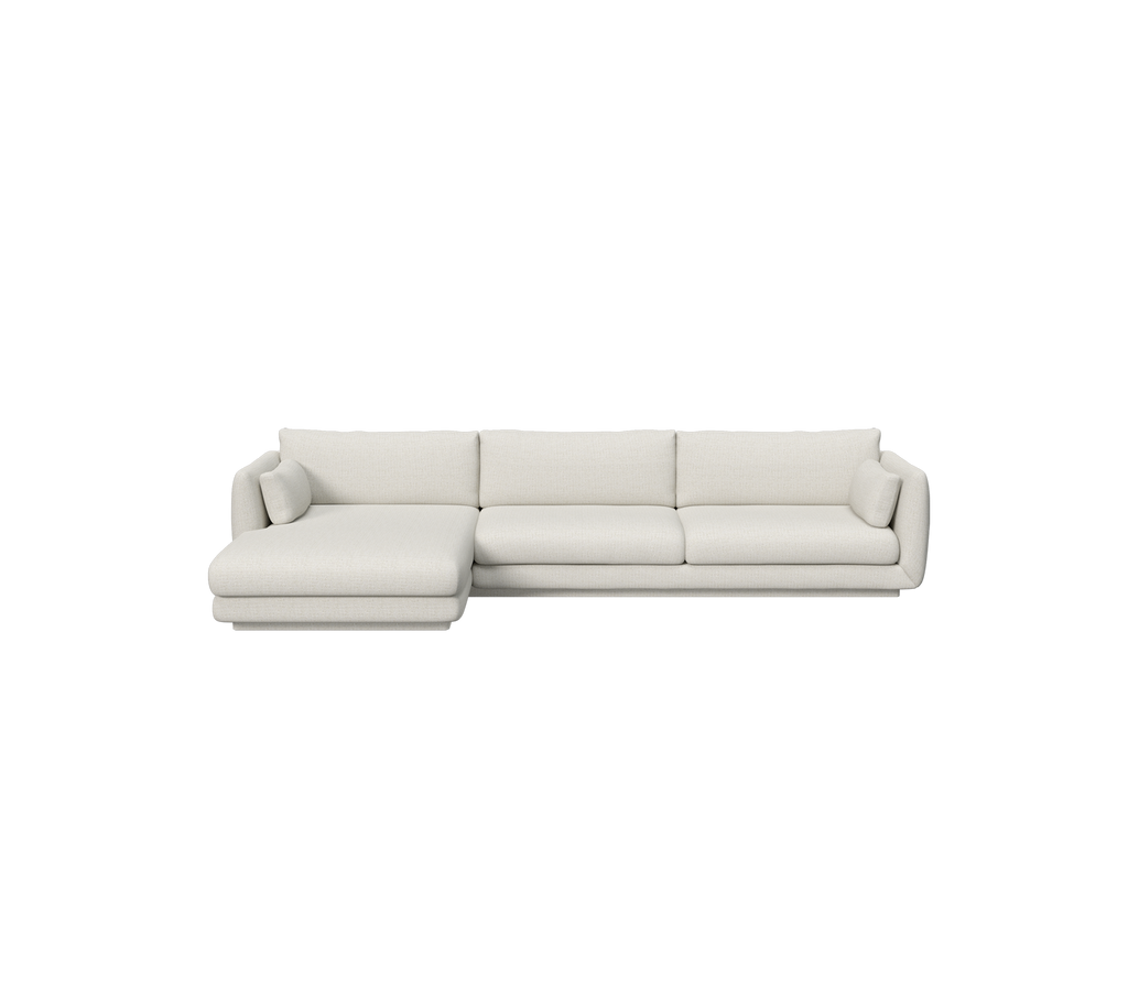 Modern sandfärgad sektionsoffa med en ren design.