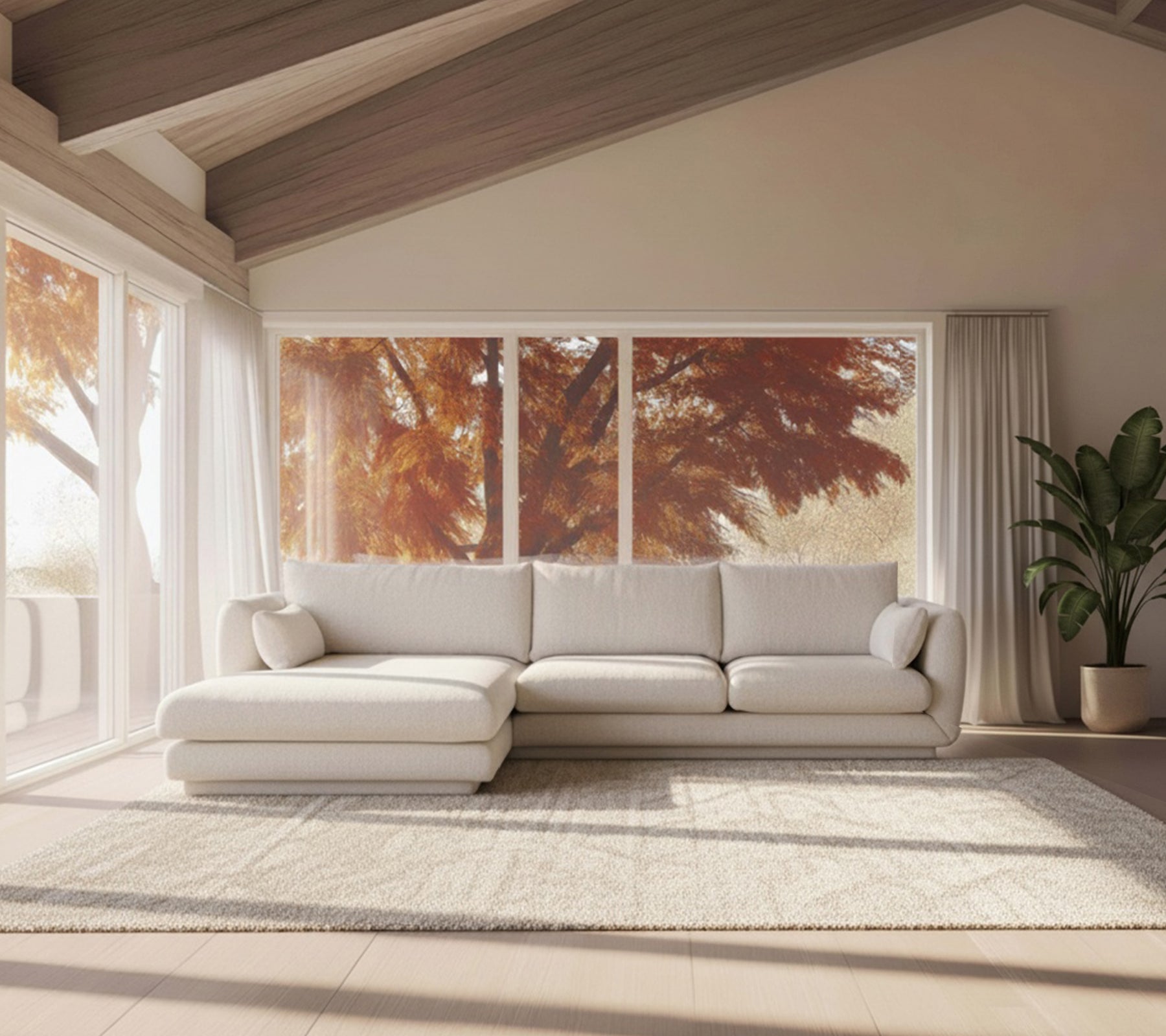 Modern vit soffa och beigt mattor i en minimalistisk loungeinställning.