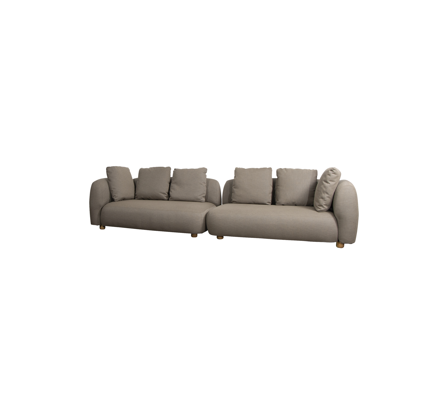 Modern L-formad soffa i en neutral ton, med mjuka kuddar och rundade armstöd, perfekt för bekväm sittplats.