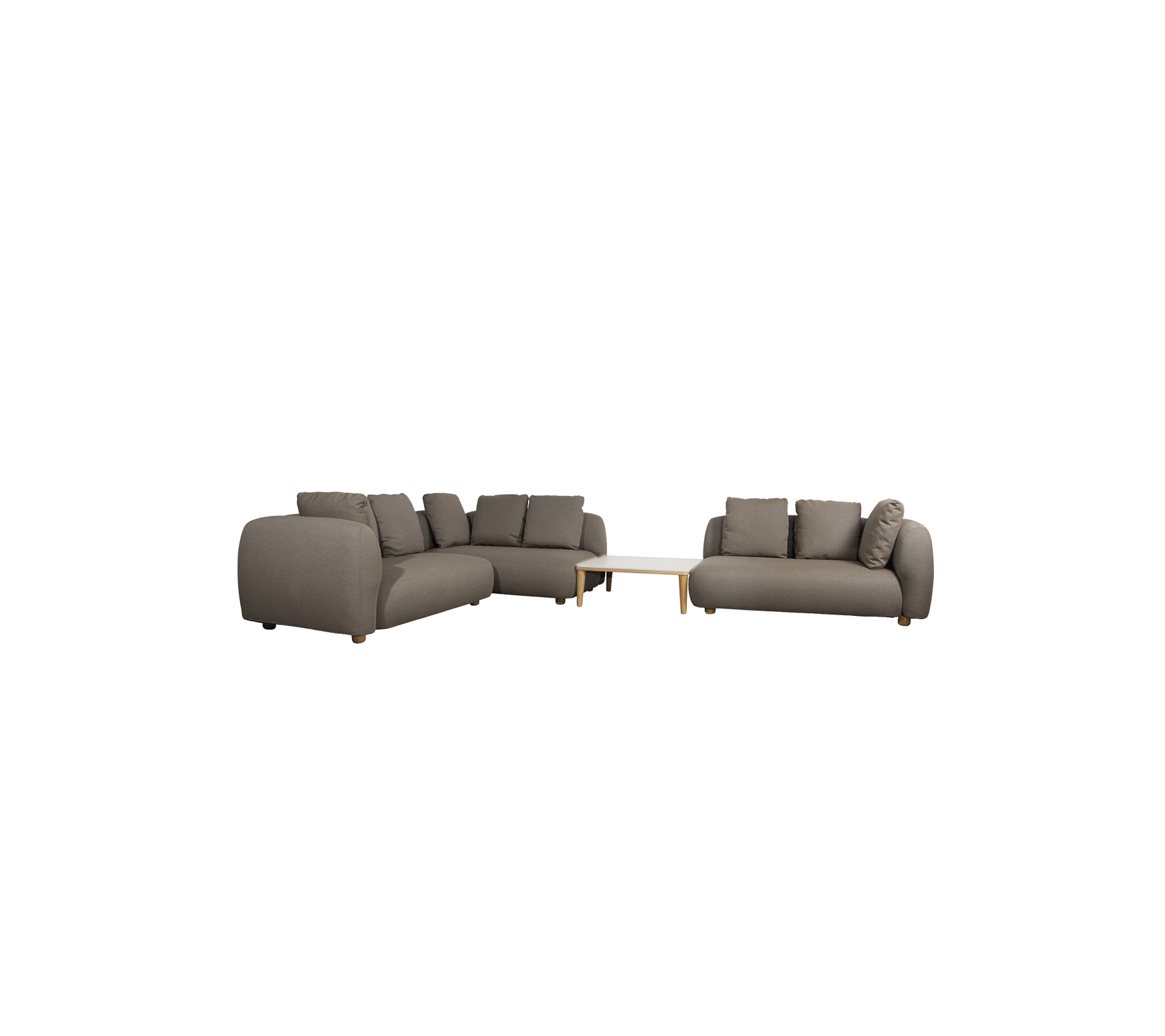 Modern taupe-soffa med kuddar och ett ljust bord i en lounge-miljö.
