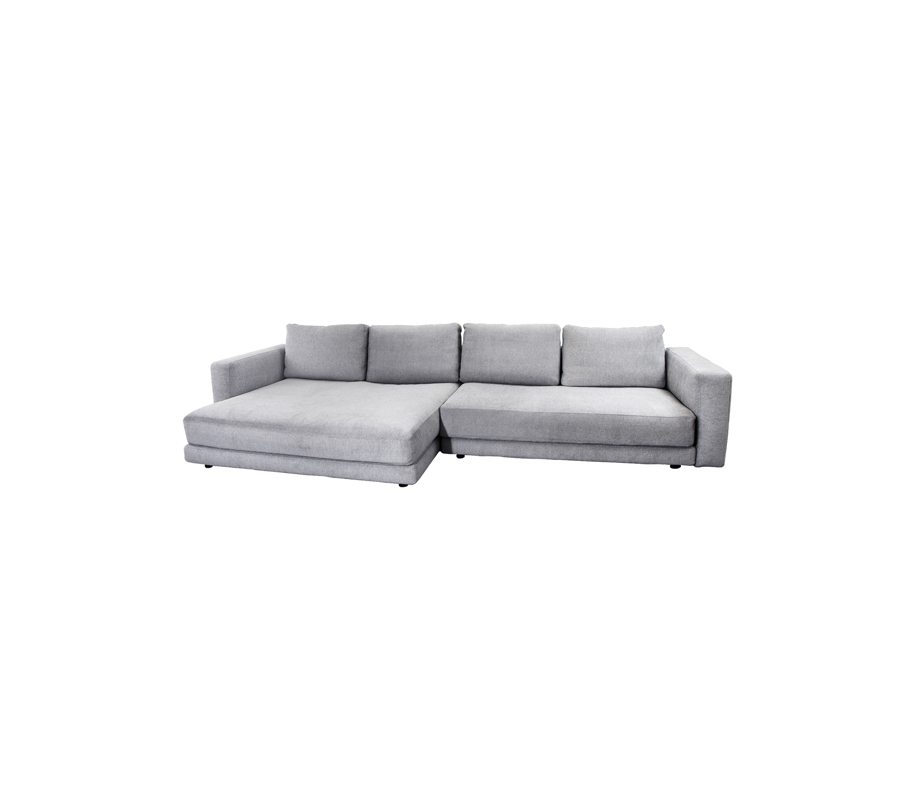 Modern grå hörnsoffa med chaise longue, med mjuka kuddar och en elegant design för bekväm sittplats.