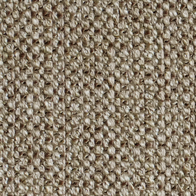 Texturerat tyg i en ljus beige färg.